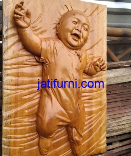 Relief Patung Babe